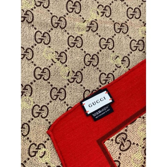 Replica Scialle reversibile Gucci in seta e cashmere con motivo GG 135 albicocca Imitazioni Replica Scialle reversibile Gucci in seta e cashmere con motivo GG 135 albicocca