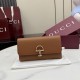 Replica di lusso Portafoglio continentale Gucci Half Horsebit 848791 Marrone Imitazioni Cloni Portafoglio continentale Gucci Half Horsebit 848791 Marrone firmate