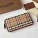 Replica di lusso Portafoglio con cerniera Burberry Vintage Check E-canvas Imitazioni Cloni Portafoglio con cerniera Burberry Vintage Check E-canvas firmate