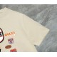Replica di lusso Maglietta girocollo Gucci unisex nera/albicocca 09 Imitazioni Cloni Maglietta girocollo Gucci unisex nera/albicocca 09 firmate