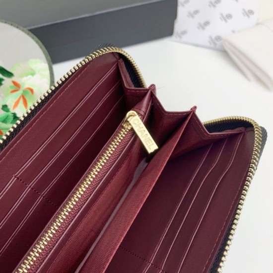 Cloni Portafoglio grande Chanel Caviar trapuntato con soffietto e cerniera nero  firmate