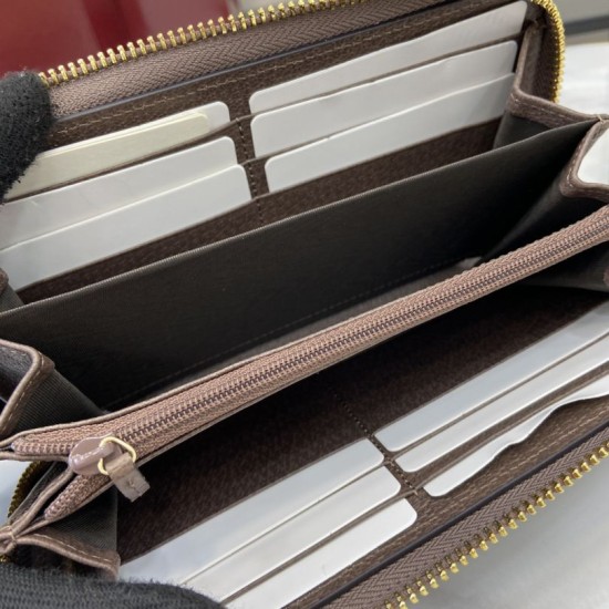 Replica di lusso Pari di alta qualità Portafoglio Gucci Ophidia con cerniera GG Supreme 772305 marrone Imitazioni Cloni Pari replica di alta qualità Portafoglio Gucci Ophidia con cerniera GG Supreme 772305 marrone firmate