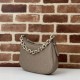 Replica Gucci 815409 GG Emblem borsa a tracolla piccola mezzaluna Talpa Riproduzione Fedele Gucci 815409 GG Emblem borsa a tracolla piccola mezzaluna Talpa imitazioni