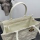 Borsa tote Dior media a libro con tracolla Pelle di vitello macrocannage bianca Replica Replica Perfette Borsa tote Dior media a libro con tracolla Pelle di vitello macrocannage bianca imitazioni