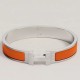 Replica Bracciale Clic HH Hermès in smalto arancione Replica Bracciale Clic HH Hermès in smalto arancione