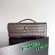 Pochette Andiamo di Bottega Veneta con manico agnello intrecciata fondente Replica Replica Perfette Pochette Andiamo di Bottega Veneta con manico agnello intrecciata fondente imitazioni