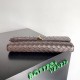 Pochette Andiamo di Bottega Veneta con manico agnello intrecciata fondente Replica Replica Perfette Pochette Andiamo di Bottega Veneta con manico agnello intrecciata fondente imitazioni