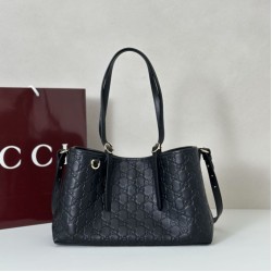 Borsa a tracolla piccola Gucci GG Emblem 847281 Marrone