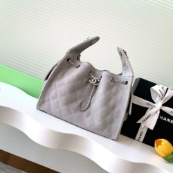 Replica Chanel AS5293 Borsa a secchiello piccola Hobo Vintage con coulisse in pelle scamosciata grigia