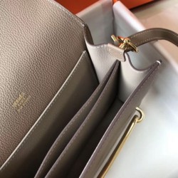 Replica Mini borsa Hermes Sac Roulis in pelle di vitello Evercolor grigia Riproduzione Fedele Mini borsa Hermes Sac Roulis in pelle di vitello Evercolor grigia imitazioni
