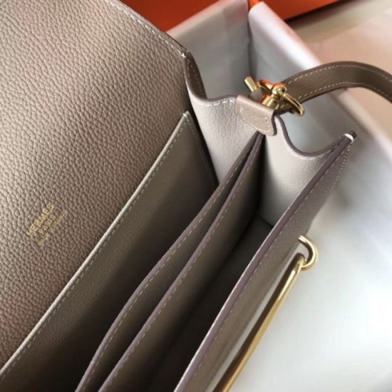 Replica Mini borsa Hermes Sac Roulis in pelle di vitello Evercolor grigia Riproduzione Fedele Mini borsa Hermes Sac Roulis in pelle di vitello Evercolor grigia imitazioni
