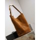 Replica Borsa a secchiello morbida Niki YSL Saint Laurent pelle scamosciata caramello Imitazioni Replica Borsa a secchiello morbida Niki YSL Saint Laurent pelle scamosciata caramello