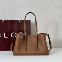 Replica Borsa tote media Gucci 815214 GG Emblem pelle goffrata marrone
