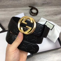 Cintura Signature uomo con fibbia G, hardware 411924 nero oro