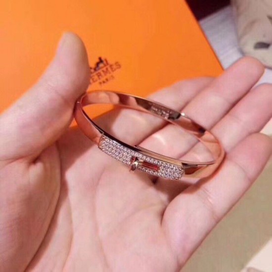 Cloni Firmate Bracciale Hermes Kelly in oro rosa con diamanti imitazioni