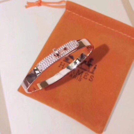 Cloni Firmate Bracciale Hermes Kelly in oro rosa con diamanti imitazioni