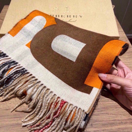 Dupe replica Scialle Burberry in lana e cashmere con motivo check double face e logo 30 x 180 arancione imitazioni perfette Replica Scialle Burberry in lana e cashmere con motivo check double face e logo 30 x 180 arancione Griffate