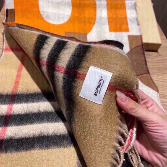 Dupe replica Scialle Burberry in lana e cashmere con motivo check double face e logo 30 x 180 arancione imitazioni perfette Replica Scialle Burberry in lana e cashmere con motivo check double face e logo 30 x 180 arancione Griffate