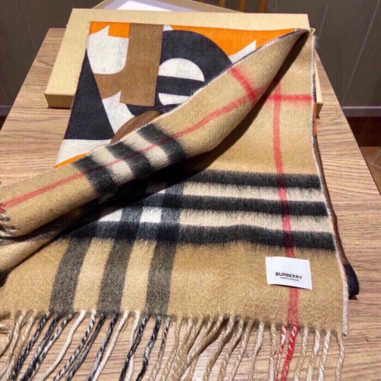 Dupe replica Scialle Burberry in lana e cashmere con motivo check double face e logo 30 x 180 arancione imitazioni perfette Replica Scialle Burberry in lana e cashmere con motivo check double face e logo 30 x 180 arancione Griffate